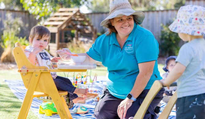 Child and educator having morning tea at Branxton early education centre