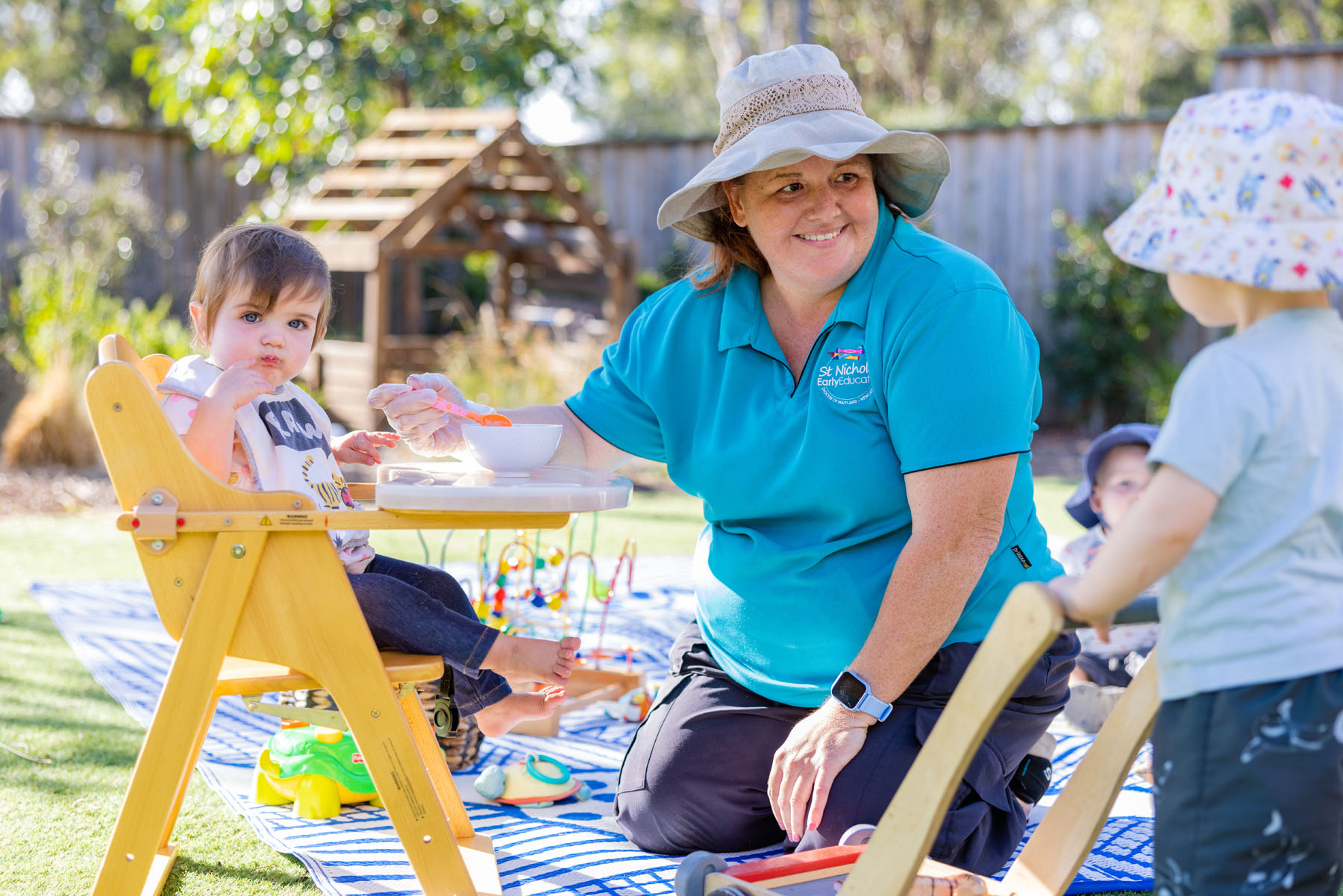 Child and educator having morning tea at Branxton early education centre
