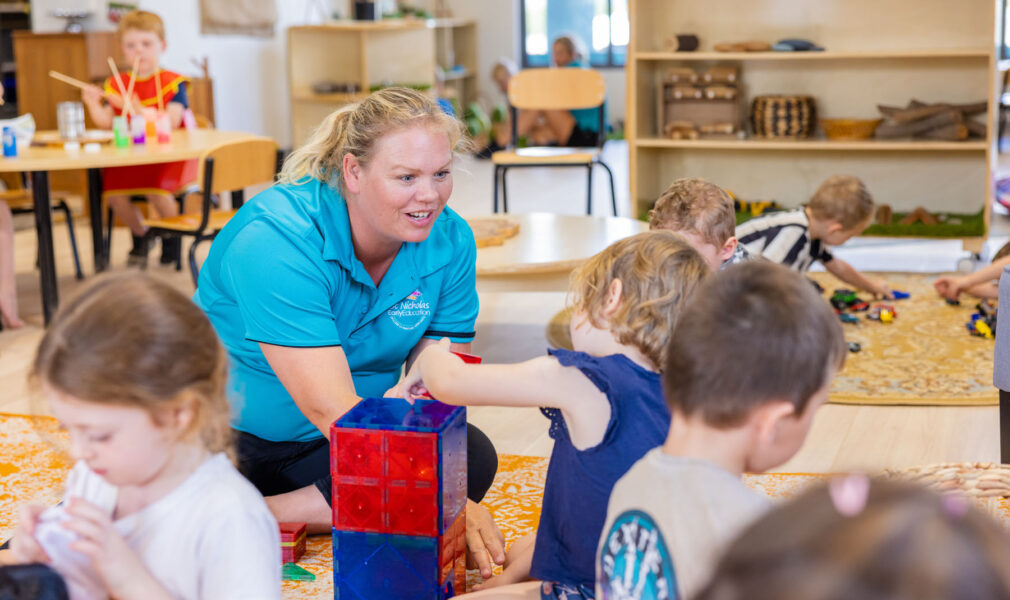 Child and educator building with blocks at Branxton early education centre