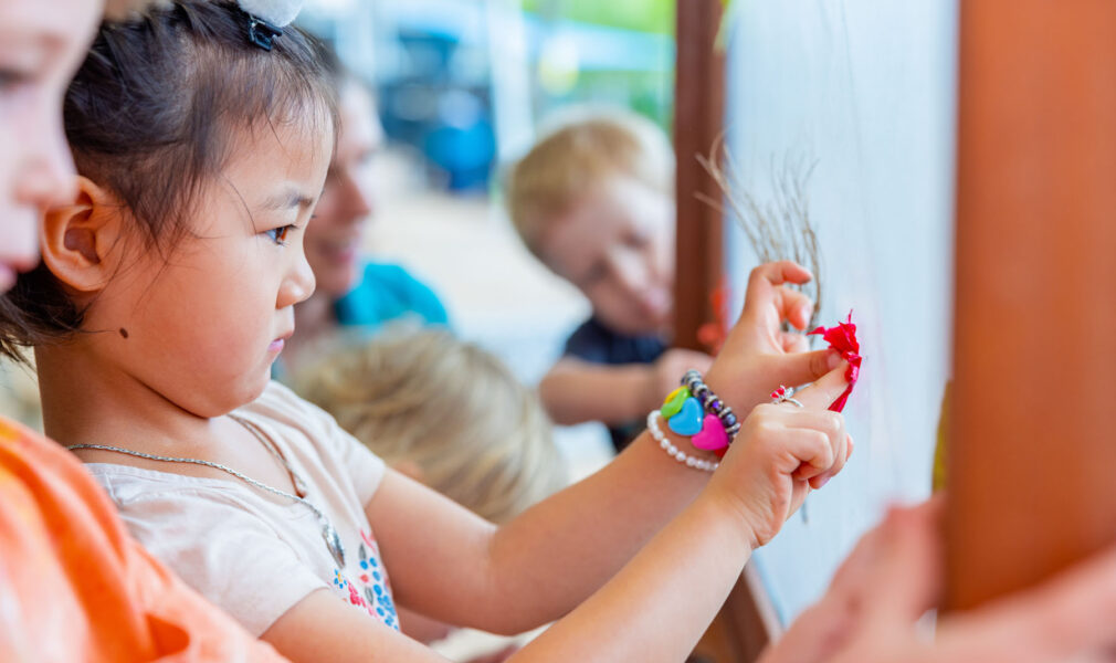 Children engaged in Reggio Emilia craft at Chisholm early education centre