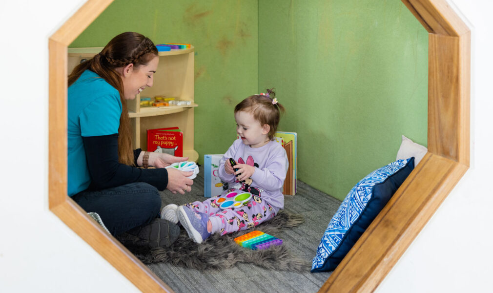 Child and educator in sensory nook at Gillieston Heights early education centre