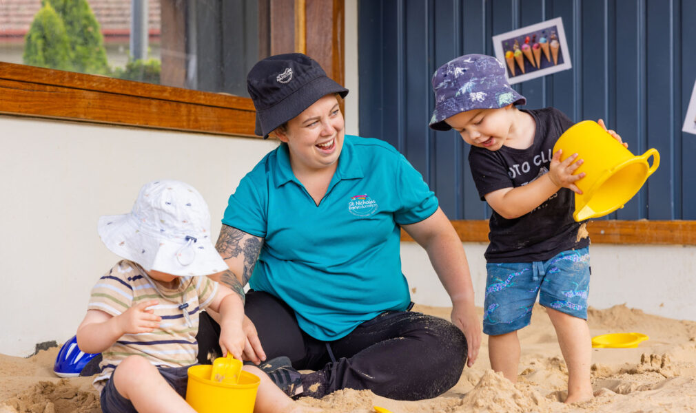 Children and educator in sandpit at Maitland early education centre