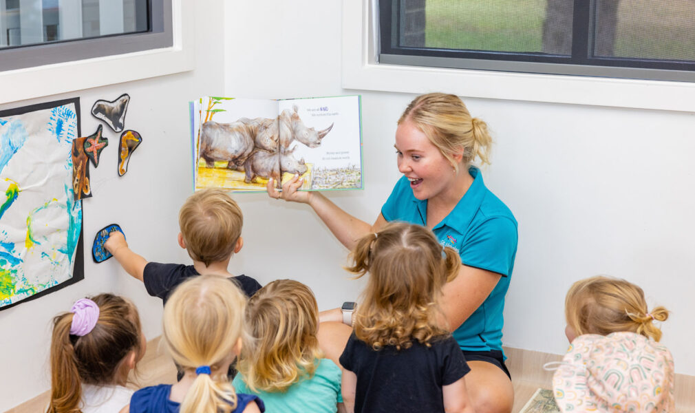 Educator reading with children at Maitland early education centre