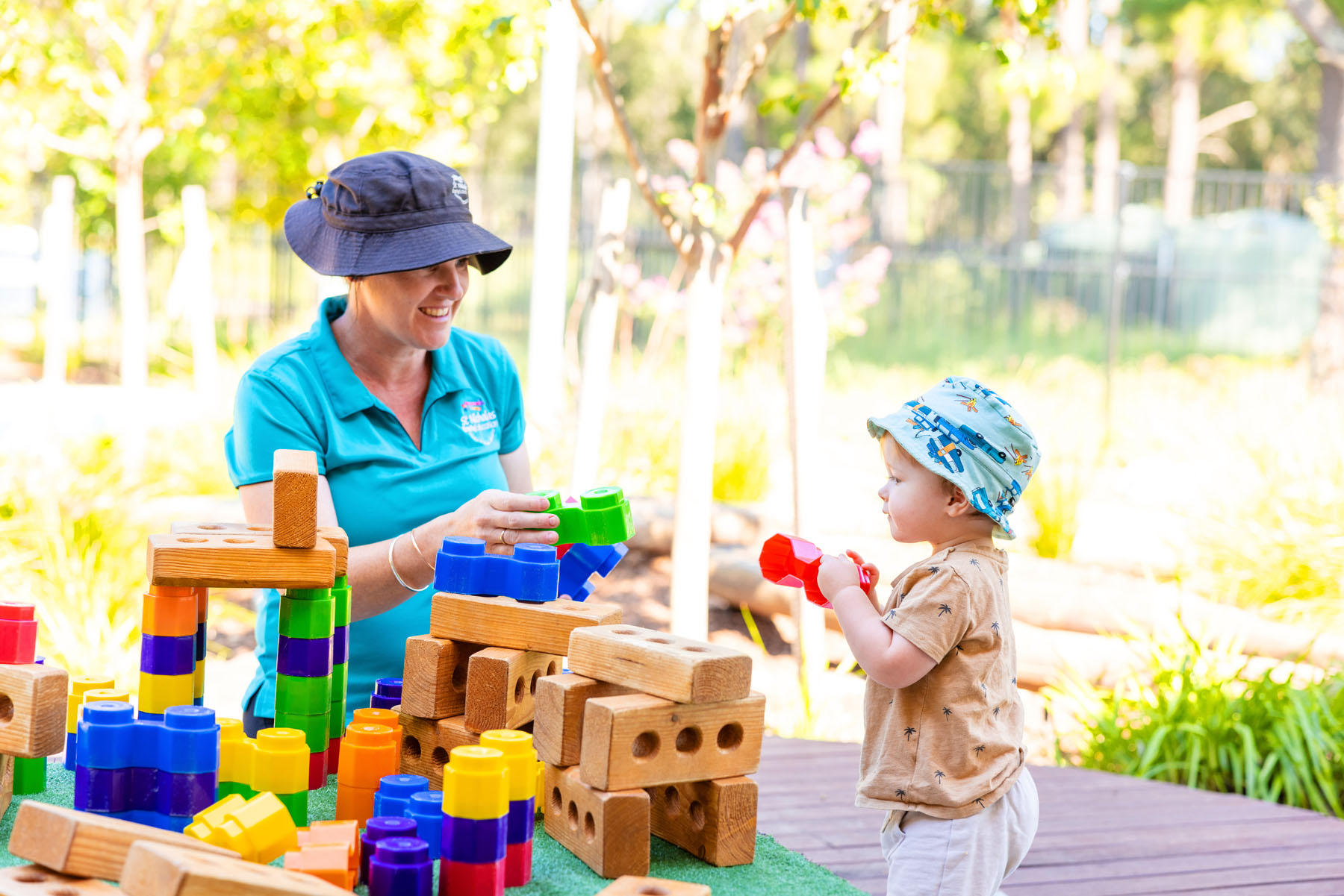 Child and educator playing with blocks at Medowie early education centre