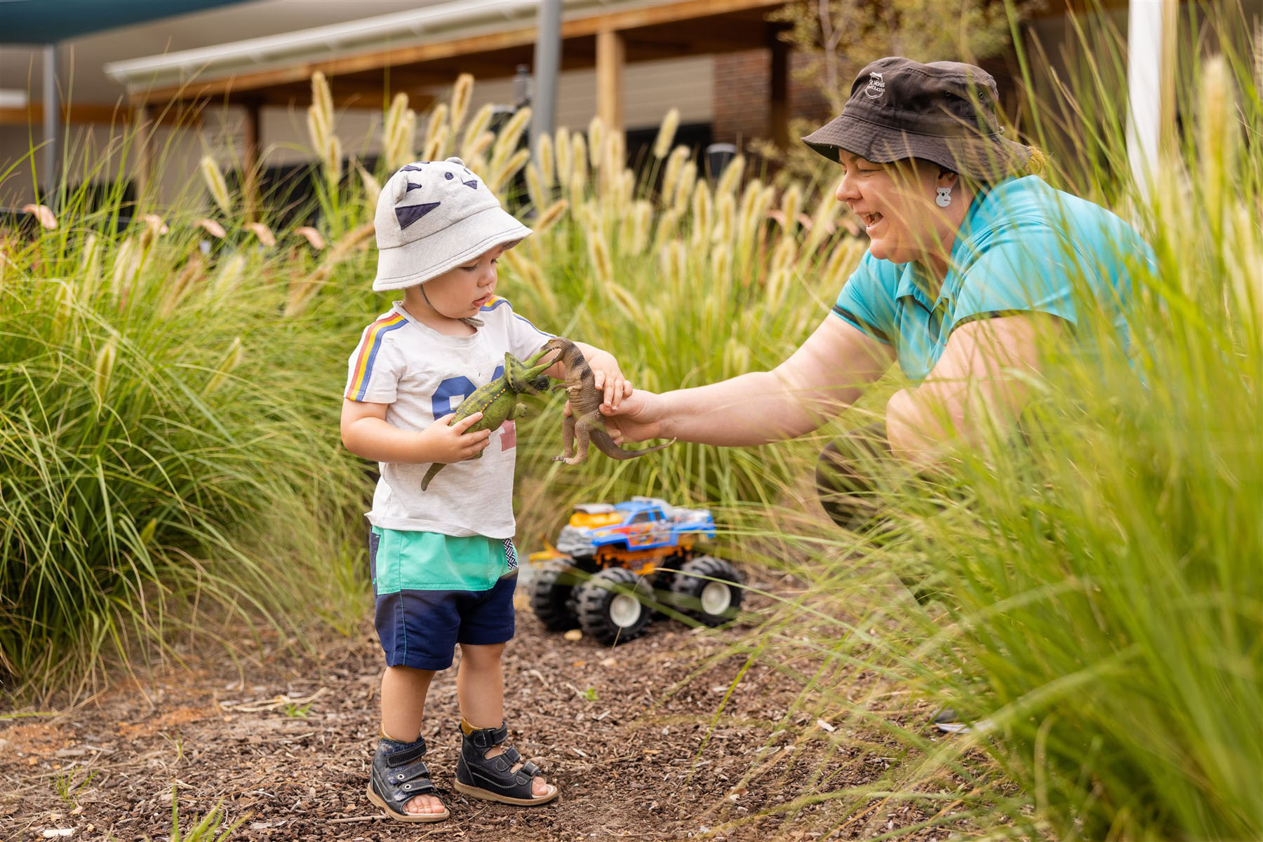 Child and educator playing outside at Muswellbrook early education centre