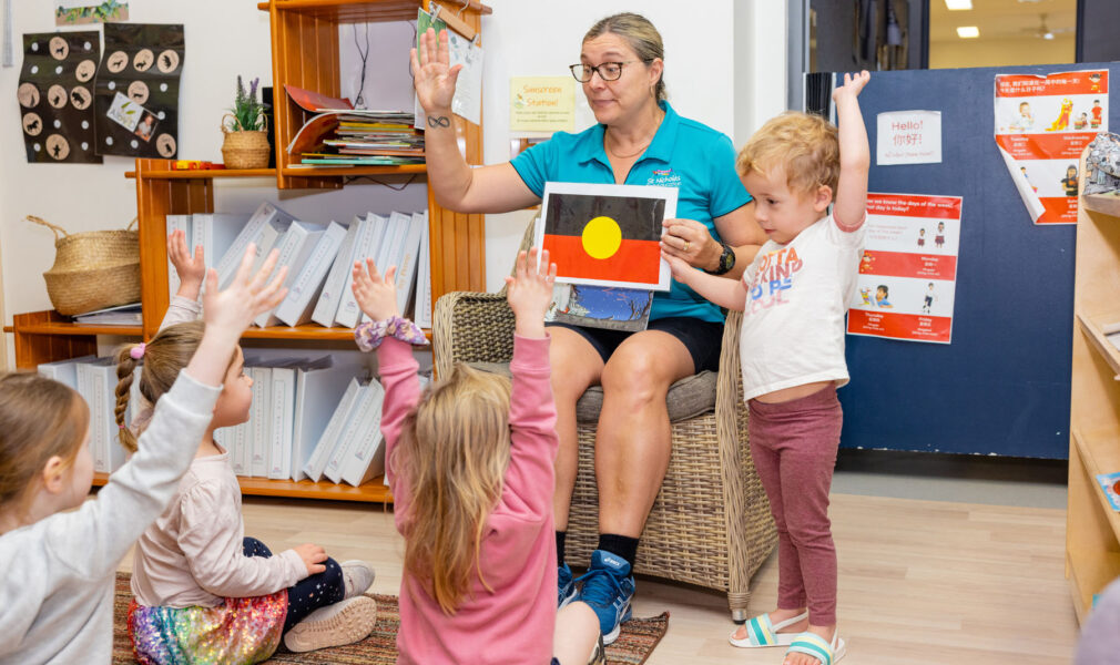 Children and educator performing acknowledgement of country at Cardiff early education centre