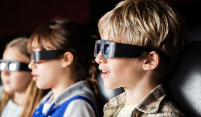 Children at a 3d cinema at vacation care