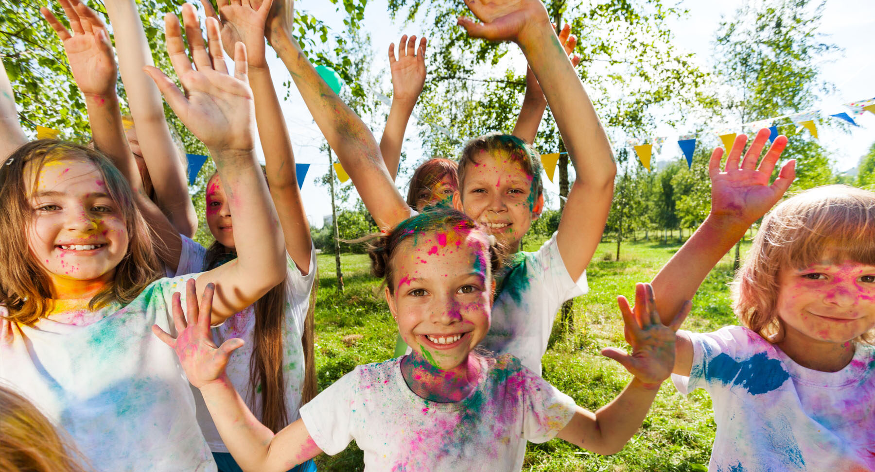 Children enjoying a colour run at St Nicholas OOSH vacation care